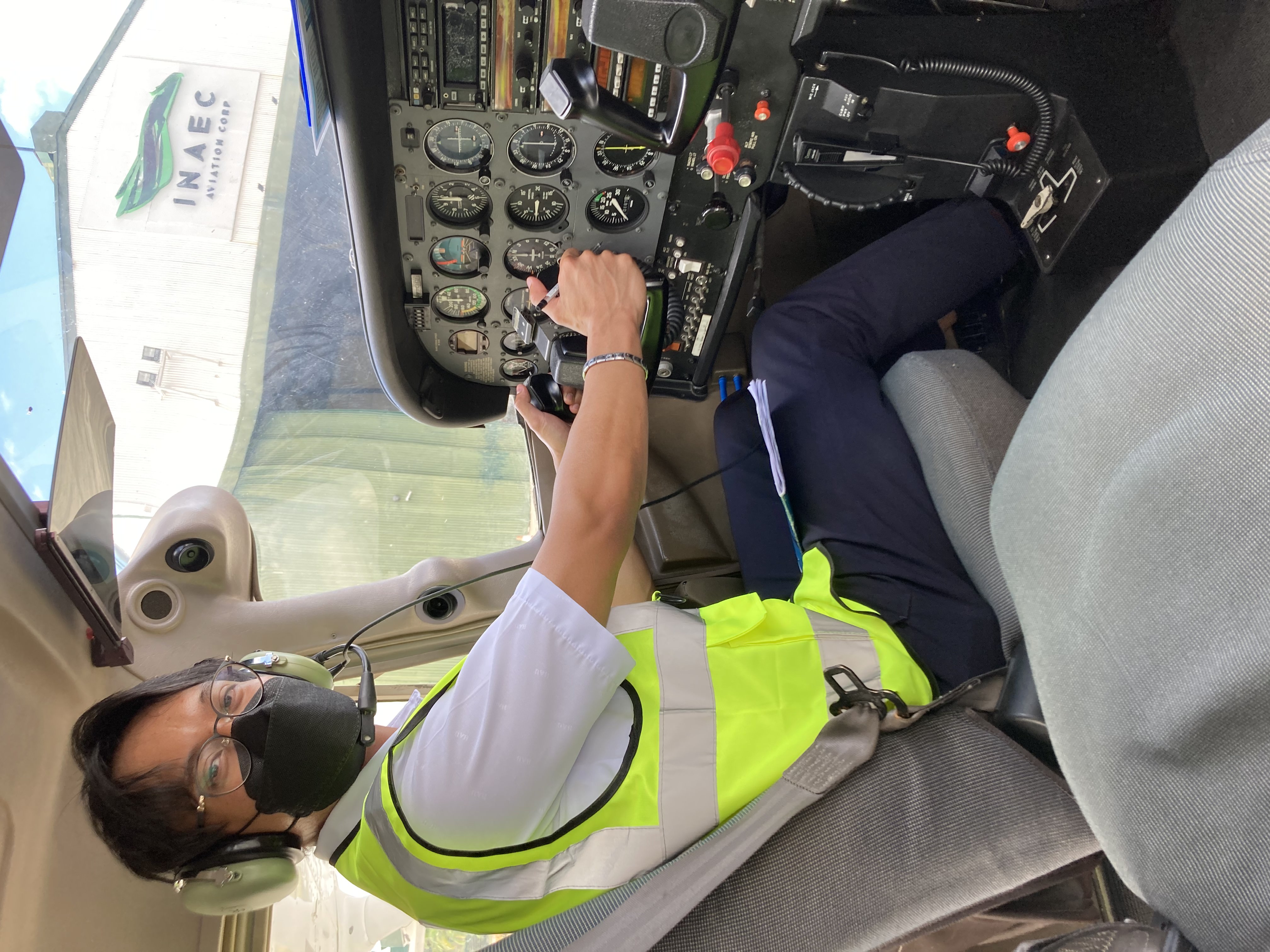 Seated at the controls of a light single-engine aircraft